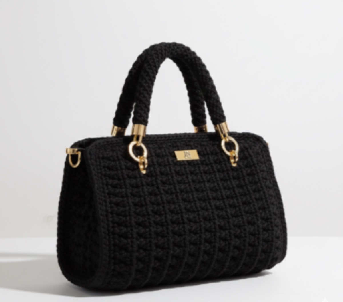 Bolso negro de mano